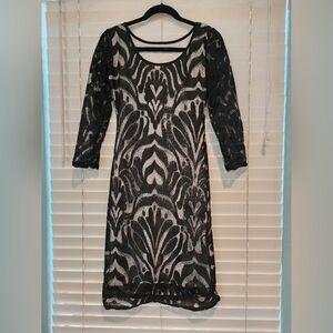 Dress, Black and White Colored, Midi Bodycon Small dress, No brand name tag.